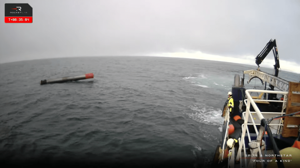 Electron's first stage on its Four Of A Kind mission after successful splash down next to Rocket Lab's recovery vessel.