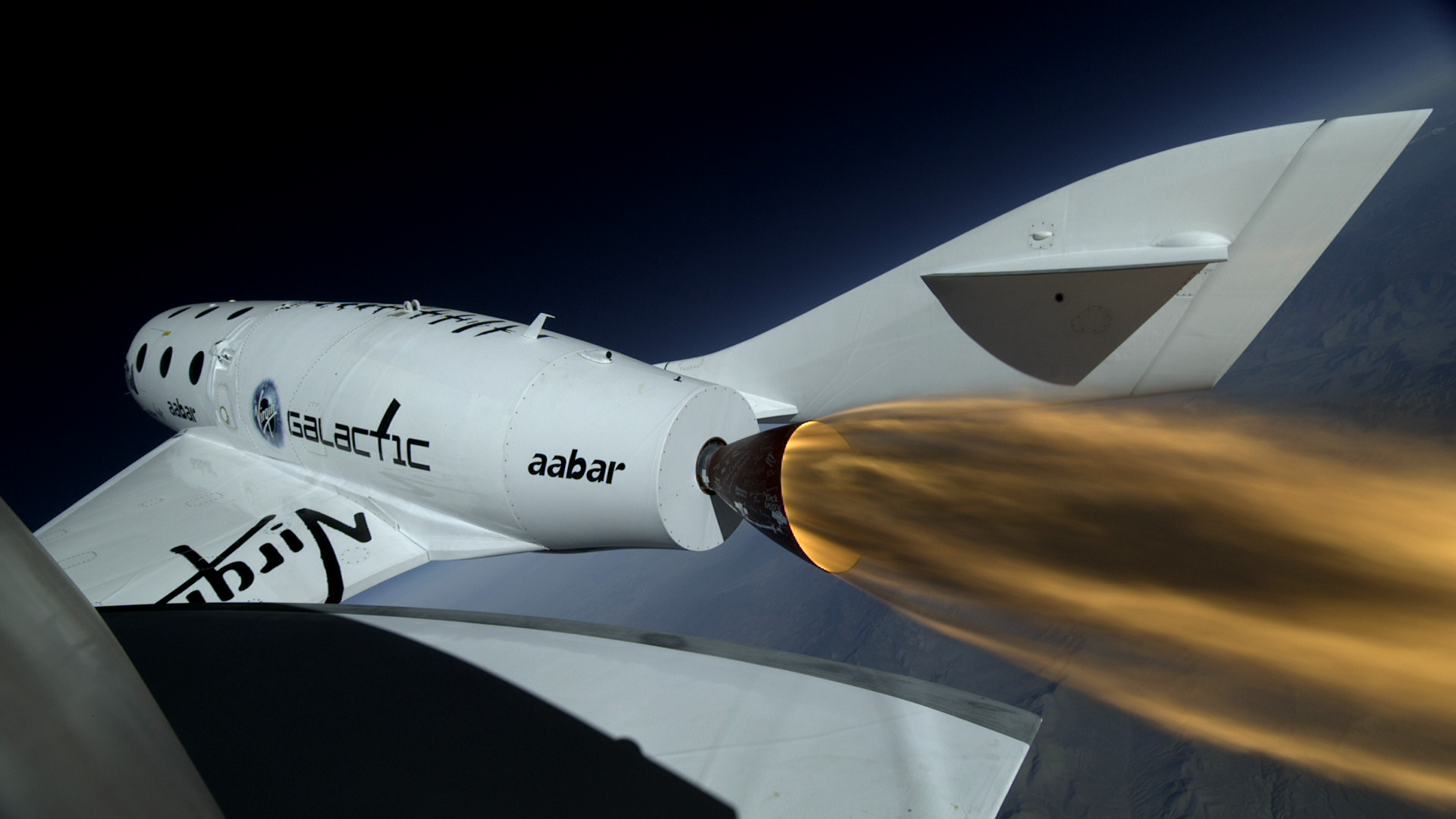 SpaceShipTwo firing its hybrid rocket engine